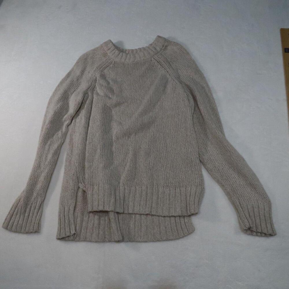 The Aerie Oatmeal Cream Chunky Knit Crewneck Pullover Sweater is a cozy and styl
